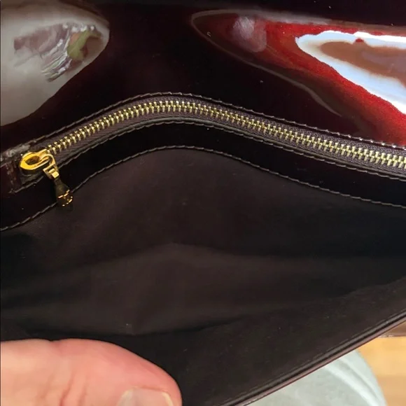 Louis Vuitton Burgundy Sobe clutch with Brass Hardware